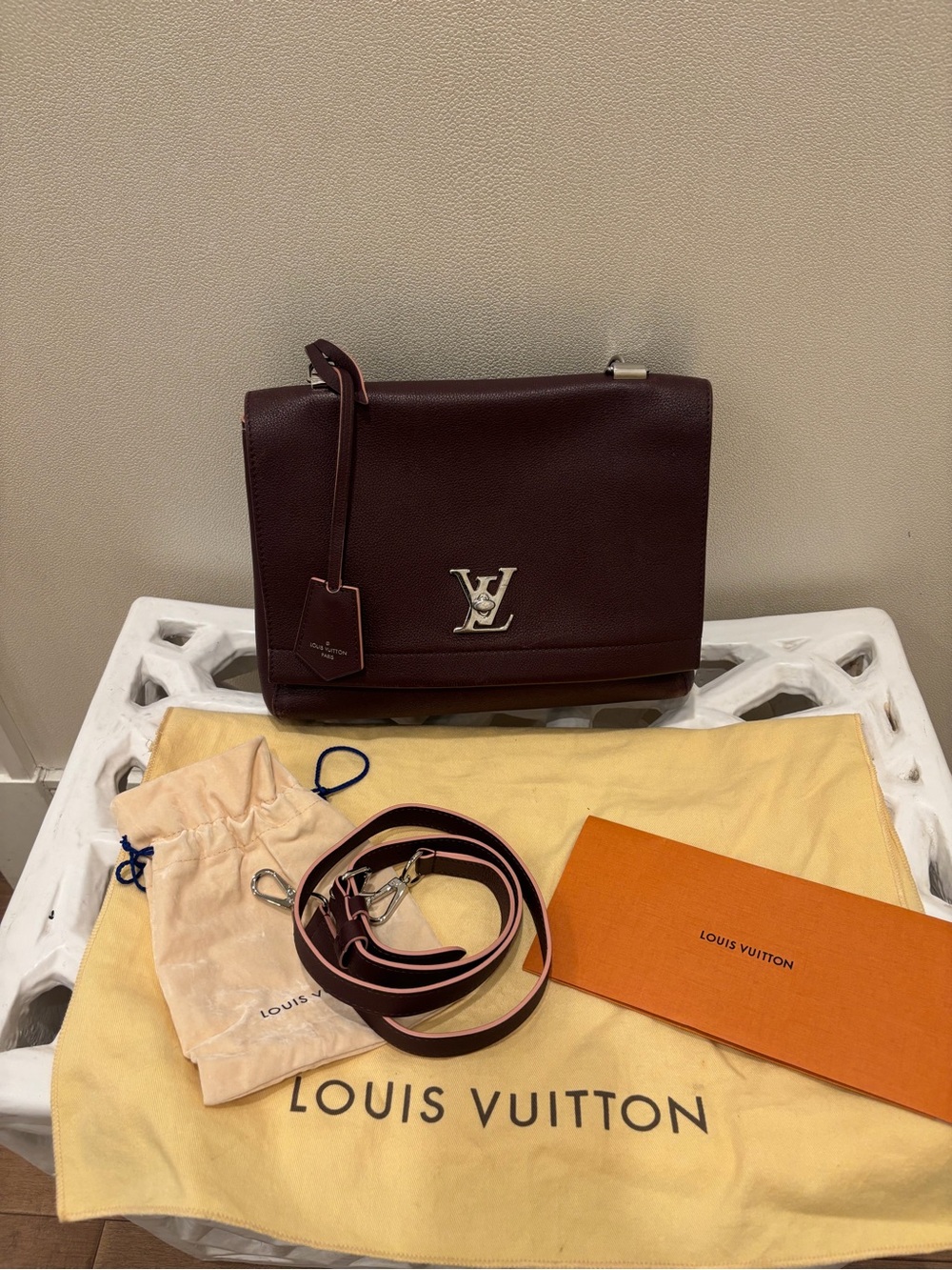 Louis Vuitton Leather Crossbody Bag in Burgundy